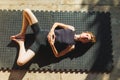 The girl is doing yoga. Young athletic woman trainer practicing yoga instructor individual training. balancing pose, modern gym,