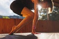 The girl is doing yoga. Young athletic woman trainer practicing yoga instructor individual training. balancing pose, modern gym,