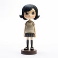 Cartoon Girl Figurine With Short Bluish-black Hair Royalty Free Stock Photo