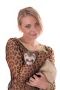 Girl with a domestic polecat Royalty Free Stock Photo