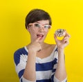 A girl with a donut Royalty Free Stock Photo