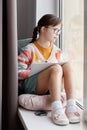 Girl With Down Syndrome Daydreaming Royalty Free Stock Photo