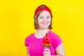 Girl Down syndrome with large Lollipop Royalty Free Stock Photo