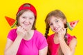 Girl Down syndrome and little girl with large Lollipop Royalty Free Stock Photo