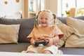 Girl with Down Syndrome Playing Videogames Royalty Free Stock Photo