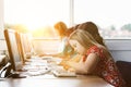 Girl with Down syndrome using computer at school Royalty Free Stock Photo