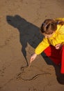 Girl drawing a heart