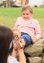 Girl drawing hearts on sole Royalty Free Stock Photo