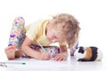 Girl drawing with pencils