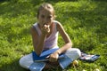 The girl draws on a meadow III Royalty Free Stock Photo