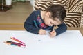 Girl draws pencil Royalty Free Stock Photo