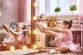 Girl dreams of becoming a ballerina Royalty Free Stock Photo