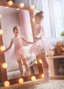 Girl dreams of becoming a ballerina Royalty Free Stock Photo