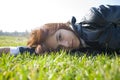 Girl with a dreamy look lying on the fresh spring Royalty Free Stock Photo