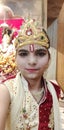 A girl dress as Hindu god krishna. Royalty Free Stock Photo