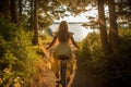 Girl in a dress on a bicycle, lit by a stunning sunset in the woods. It\'s a sign of freedom and vacation. Generative Ai