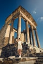 Girl in a dress on ruins. Capitol. Travel, vacation. Tunisia, Dougga.