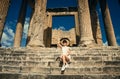 Girl in a dress on ruins. Capitol. Travel, vacation. Tunisia, Dougga.