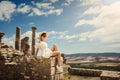 Girl in a dress on ruins. Capitol. Travel, vacation. Tunisia, Dougga.