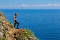 A girl standing at Baikal lake