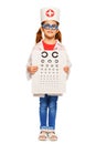 Girl dressed in ophthalmologist's costume and cap