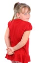 Girl dressed in red looking over shoulder isolated Royalty Free Stock Photo