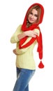 Girl dressed red woolen cap and scarf posing in studio on white background Royalty Free Stock Photo