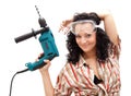 Girl with drilling machine Royalty Free Stock Photo