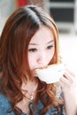 Girl drinking coffee Royalty Free Stock Photo