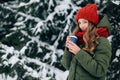 Girl drinking coffee in winter cold day. Royalty Free Stock Photo