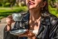 Girl drinking coffee. Woman holding cup hot coffees in hands. Girl drinking coffee. White mug hot coffee in the hands Royalty Free Stock Photo