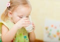 Girl drinking milk Royalty Free Stock Photo