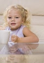 Girl Drinking out of Mug Royalty Free Stock Photo