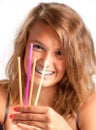 Girl with drinking straws Royalty Free Stock Photo