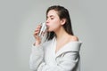 Girl drinking water glass. Beautiful young woman with clean fresh skin. Royalty Free Stock Photo