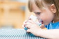 Girl drinking water outdoors Royalty Free Stock Photo