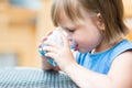 Girl drinking water outdoors Royalty Free Stock Photo