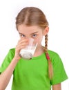 Girl drinks milk from a glass Royalty Free Stock Photo