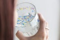 Girl drinks polluted water microplastic Royalty Free Stock Photo