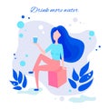 A girl drinks water through a straw. Rest at the resort. Beautiful dynamic girl with water. Young woman drinking water. The girl i Royalty Free Stock Photo