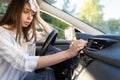 Girl driver has problem with non-working conditioner hand checking flow cold air suffering from heat
