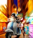 Girl drives moped Royalty Free Stock Photo