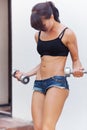 Girl with dumbell