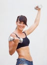 Girl with dumbell Royalty Free Stock Photo