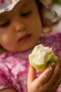 Girl eating an apple Royalty Free Stock Photo