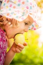 Girl eating an apple Royalty Free Stock Photo