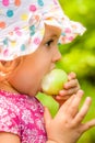 Girl eating an apple Royalty Free Stock Photo