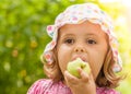 Girl eating an apple Royalty Free Stock Photo