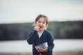 The girl eating blueberries from a glass bowl Royalty Free Stock Photo