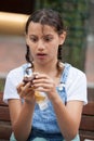 Girl Eating a Boston Cream Pie